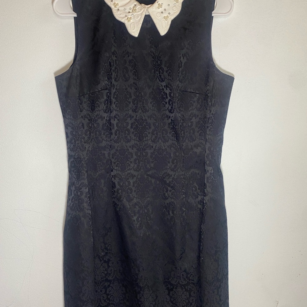 Eva Mendes Black Sleeveless Sheath Dress with Peter Pan Collar